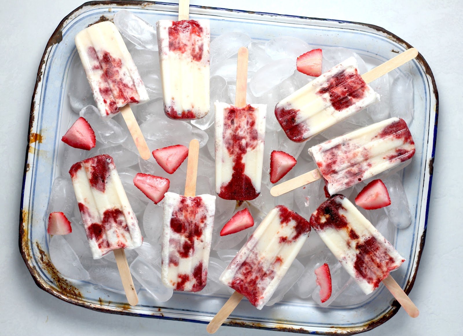 strawberry popsicles over ice